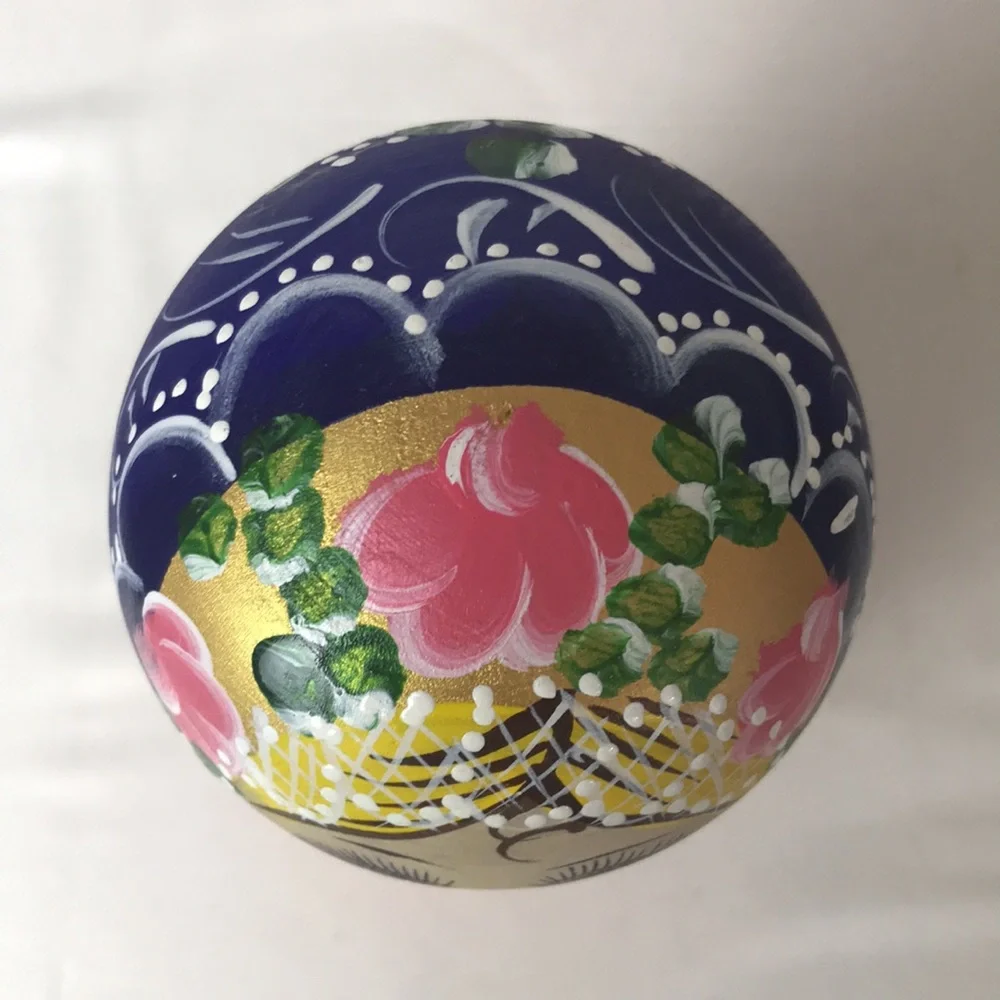 Beautifully decorated nesting dolls set